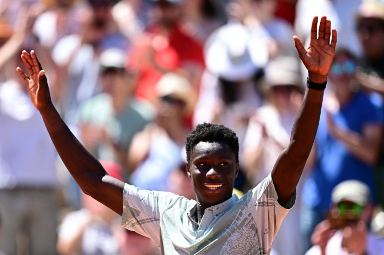Teenage Frenchman Moise Kouame becomes youngest male Grand Slam winner in 17 years.