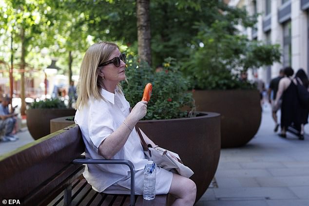 Experts warn cold showers trap heat; lukewarm water cools better.