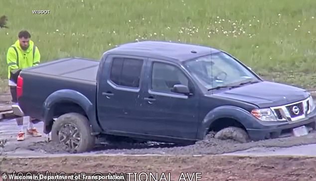 Wisconsin driver ignores road closure, gets stuck in concrete